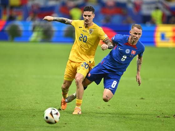 Dennis Man and Ondrej Duda during the UEFA EURO 2024 football match between Slovakia and Romania at the Frankfurt Arena in Frankfurt, Wednesday, June 26, 2024 Frankfurt Copyright: xRazvanxPasarica SPORTxPICTURESx