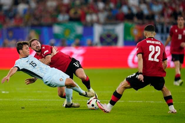 GER: Georgia v Portugal. UEFA EURO, EM, Europameisterschaft,Fussball 2024 Joao Neves of Portugal and Georges Mikautadze and Otar Kiteishvili of Georgia during the UEFA Euro 2024 match between Georgia and Portugal, Group F, date 3, played at Veltins-Arena stadium on June 26, 2024 in Gelsenkirchen, Germany. kpng Copyright: xSergioxRuizx xPRESSINPHOTOx PS_240626_GEO_POR_038