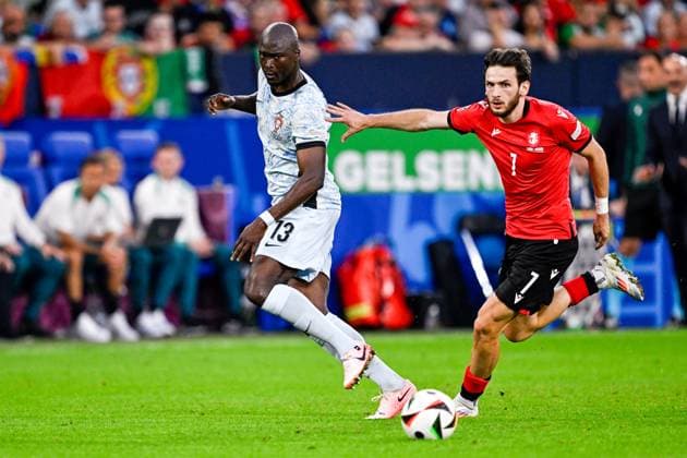 2024-06-26 Georgia v Portugal - Group F - UEFA EURO, EM, Europameisterschaft,Fussball 2024 GELSENKIRCHEN, GERMANY - JUNE 26: Danilo of Portugal battles for possession with Khvicha Kvaratskhelia of Georgia during the Group F - UEFA EURO 2024 match between Georgia and Portugal at Arena AufSchalke on June 26, 2024 in Gelsenkirchen, Germany. (Photo by Pablo Morano BSR Agency) Gelsenkirchen Germany Content not available for redistribution in The Netherlands directly or indirectly through any third parties. Copyright: xBSRxAgencyx