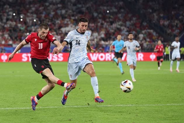 Giorgi Chakvetadze of Georgia takes a shot but fails to score Georgia v Portugal, UEFA European Championship, EM, Europameisterschaft 2024, Group F, Football, Arena AufSchalke, Gelsenkirchen, Germany - 26 Jun 2024 EDITORIAL USE ONLY No use with unauthorised audio, video, data, fixture lists, club league logos or live services. Online in-match use limited to 120 images, no video emulation. No use in betting, games or single club league player publications.  Copyright: xPaulxCurrie Shutterstockx 14555619fl