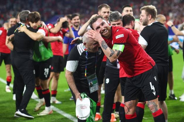 Georgia v Portugal 26 June 2024, Gelsenkirchen - UEFA EUROs - Group F - Georgia v Portugal - Guram Kashia of Georgia celebrates victory with his team mates - Photo: Charlotte Wilson Offside. Gelsenkirchen Germany Copyright: xCharlottexWilsonx xOffsidexOffside