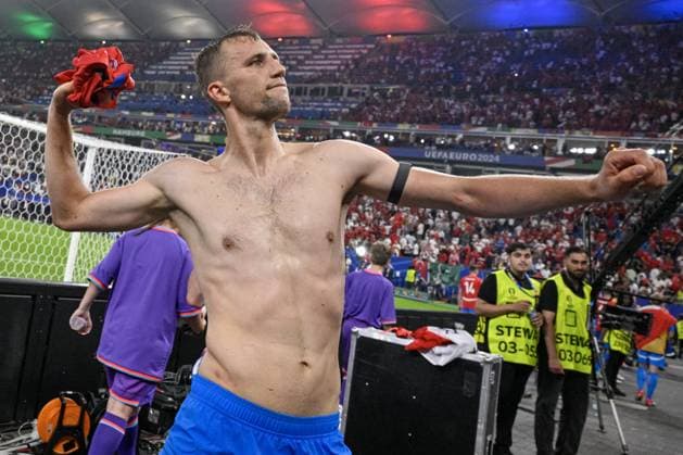 Czech Tomas Soucek throws the soccer jersey to the fans after the Group F match of the European Football Championship: Turkey vs Czechia, in Hamburg, Germany, on June 26, 2024. (CTKxPhoto VitxSimanek) CTKPhotoP2024062610850  CTKPhotoP2024062610850
