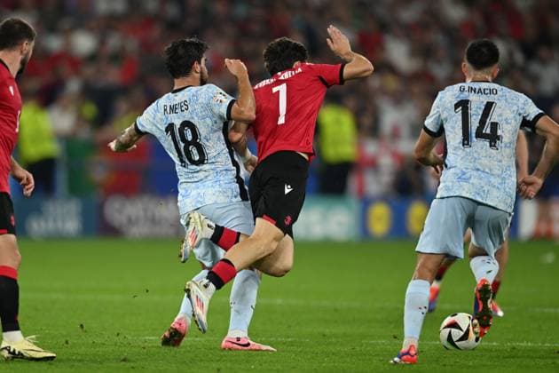 Ruben Neves (Portugal)Khvicha Kvaratskhelia (Georgia)Goncalo Inacio (Portugal) during the UEFA EURO, EM, Europameisterschaft,Fussball Germany 2024 match between Georgia 2-0 Portugal at Arena AufSchalke on June 26, 2024 in Gelsenkirchen, Germany. Noxthirdxpartyxsales  (257799364)