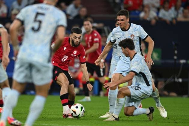 Georges Mikautadze (Georgia)Joao Palhinha (Portugal) during the UEFA EURO, EM, Europameisterschaft,Fussball Germany 2024 match between Georgia 2-0 Portugal at Arena AufSchalke on June 26, 2024 in Gelsenkirchen, Germany. Noxthirdxpartyxsales  (257799485)