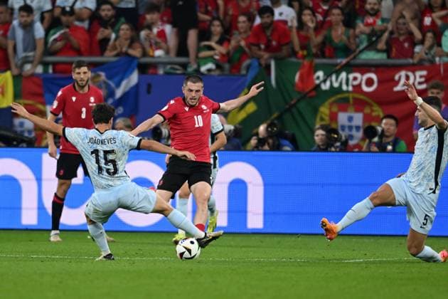 Joao Neves (Portugal)Giorgi Chakvetadze (Georgia)Diogo Dalot (Portugal) during the UEFA EURO, EM, Europameisterschaft,Fussball Germany 2024 match between Georgia 2-0 Portugal at Arena AufSchalke on June 26, 2024 in Gelsenkirchen, Germany. Noxthirdxpartyxsales  (257799651)