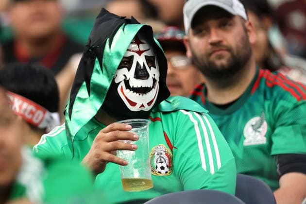 Venezuela v Mexico 26 June 2024 Inglewood USA, Copa America Venezuela v Mexico - a masked fan holding a beer. (Photo by Mark Leech). Inglewood California USA Copyright: xMarkxLeechxOffside