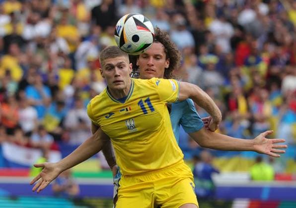 (240627) -- STUTTGART, June 27, 2024 -- Wout Faes (R) of Belgium vies with Artem Dovbyk of Ukraine during the UEFA EURO, EM, Europameisterschaft,Fussball 2024 Group E match between Belgium and Ukraine in Stuttgart, Germany, June 26, 2024. (Photo by Xinhua) (SP)GERMANY-STUTTGART-FOOTBALL-EURO 2024-BELGIUM VS UKRAINE PhilippexRuiz 