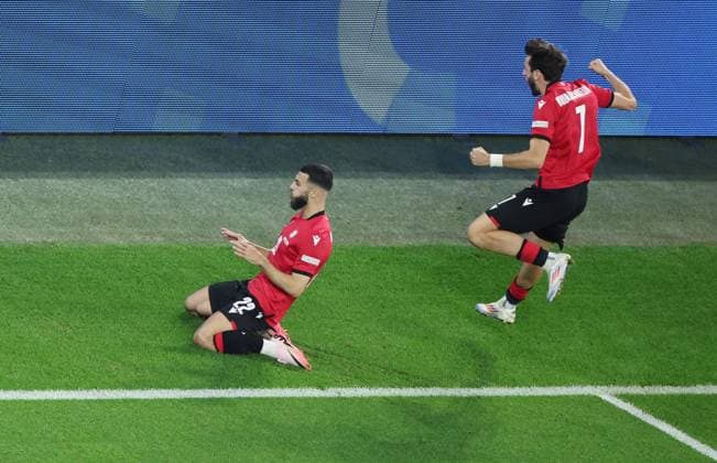 (240627) -- GELSENKIRCHEN, June 27, 2024 -- Georges Mikautadze (L) of Georgia celebrates scoring a penalty with teammate Khvicha Kvaratskhelia during the UEFA EURO, EM, Europameisterschaft,Fussball 2024 Group F match between Portugal and Georgia in Gelsenkirchen, Germany on June 26, 2024. ) (SP)GERMANY-GELSENKIRCHEN-FOOTBALL-EURO 2024-PORTUGAL VS GEORGIA BaixXuefei 