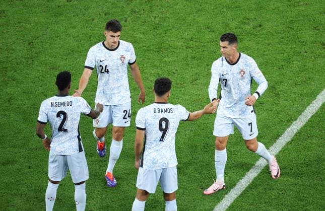 (240627) -- GELSENKIRCHEN, June 27, 2024 -- Cristiano Ronaldo (1st R) of Portugal clap hands with teammate Goncalo Ramos (2nd R) during the UEFA EURO, EM, Europameisterschaft,Fussball 2024 Group F match between Portugal and Georgia in Gelsenkirchen, Germany on June 26, 2024. ) (SP)GERMANY-GELSENKIRCHEN-FOOTBALL-EURO 2024-PORTUGAL VS GEORGIA BaixXuefei 
