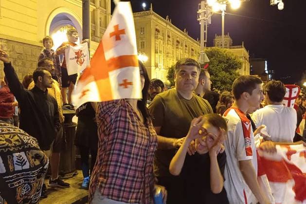 GEORGIA, TBILISI - JUNE 27, 2024: Football fans celebrate Georgiaâ€™s victory over Portugal in their UEFA EURO, EM, Europameisterschaft,Fussball 2024 Group F match. Georgiaâ€™s national team, Nationalteam won 2-0 to secure qualification to the knockout stages of the tournament. Inna Kukudzhanova TASS  0701936873st