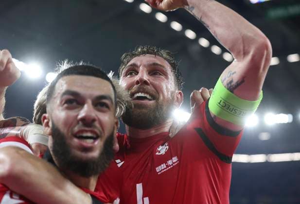 Football - 2024 UEFA European Championship, EM, Europameisterschaft Finals - Group F - Gerogia vs Portugal - Arena AufSchalke, Gelsenkirchen - Wednesday 26th Junes 2024 Georges Mikautadze of Georgia and Guram Kashia of Georgia celebrates at full time as Georgia qualify for the next round of Euro 2024 