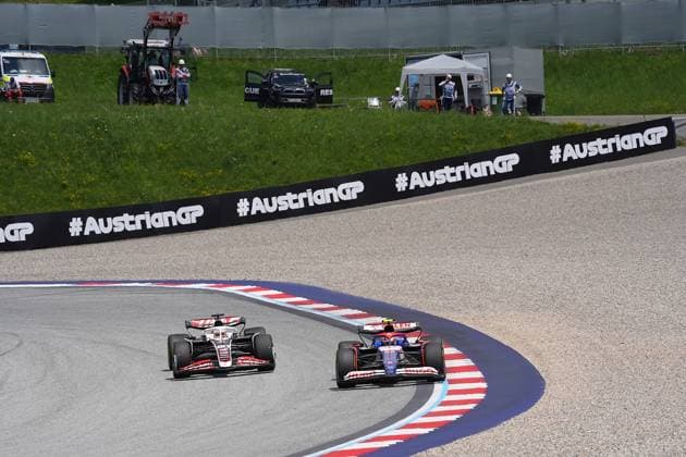 28.06.2024, Red Bull Ring, Spielberg, Formel 1 Großer Preis von Österreich 2024 , im Bild Yuki Tsunoda (JPN), Visa Cash App RB Formula One Team, Kevin Magnussen (DNK), Haas F1 Team Defodi-506_20240628_hbr_4347