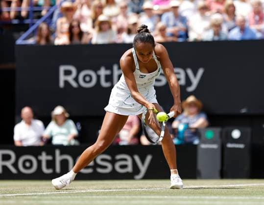 28th June 2024; Devonshire Park, Eastbourne, East Sussex, England: Rothesay International Eastbourne, Day 5, Leylah Fernadez (CAN) plays a backhand against Madison Keys (USA) in the womens singles semi-final match  ActionPlus12661182 HongboxChen