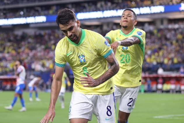 Paraguay v Brazil Copa America 28 June 2024 Las Vegas USA, Copa America Paraguay v Brazil - Lucas Paqueta celebrates after scoring the fifth goal for Brazil and is playfully pushed by Savio of Brazil. (Photo by Mark Leech). Las Vegas Nevada USA Copyright: xMarkxLeechxOffside