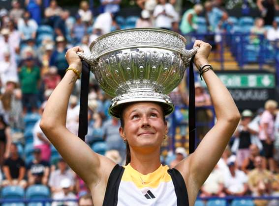 29th June 2024; Devonshire Park, Eastbourne, East Sussex, England: Rothesay International Eastbourne, Day 6; Daria Kasatkina celebrates with the Rothesay International trophy after winning the womens singles final match  ActionPlus12661473 HongboxChen