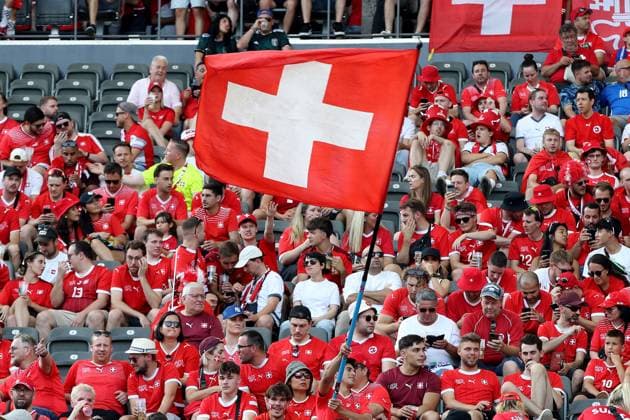 29.06.2024, xtgx, Fussball EM 2024 1 8 Finale, Schweiz - Italien emspor, v.l. Emotionen, Fans, Stimmung, Fahnen, Logo, Schweiz, weiss rot, Zuschauer, Trikots (UEFA REGULATIONS PROHIBIT ANY USE OF PHOTOGRAPHS as IMAGE SEQUENCES and or QUASI-VIDEO) Berlin