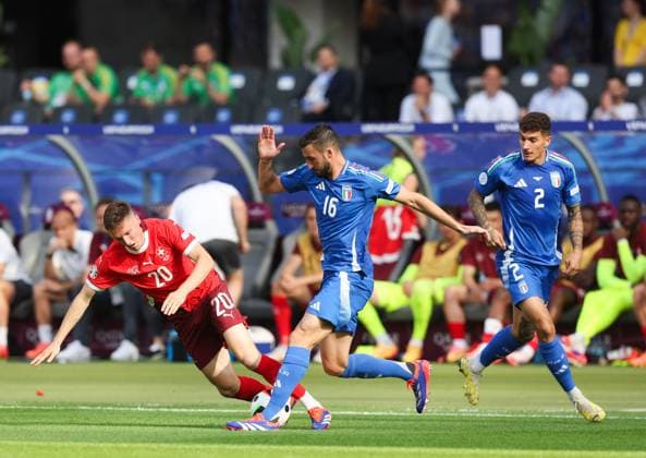 Michel Aebischer of Switzerland and Bryan Cristante and Giovanni Di Lorenzo of Italy Switzerland v Italy, UEFA European Championship, EM, Europameisterschaft 2024, Round of 16, Football, Olympiastadion, Berlin, Germany - 29 Jun 2024 EDITORIAL USE ONLY No use with unauthorised audio, video, data, fixture lists, club league logos or live services. Online in-match use limited to 120 images, no video emulation. No use in betting, games or single club league player publications. Copyright: xPaulxCurrie Shutterstockx 14562043ad