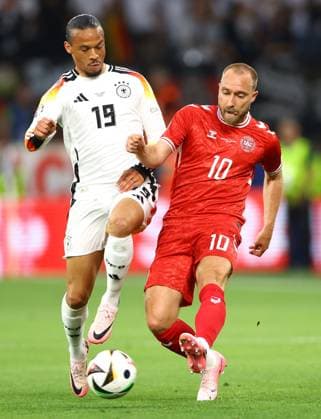 Leroy Sane of Germany and Christian Eriksen of Denmark Germany v Denmark, UEFA European Championship, EM, Europameisterschaft 2024, Round of 16, Football, BVB Stadion, Dortmund, Germany - 29 Jun 2024 EDITORIAL USE ONLY No use with unauthorised audio, video, data, fixture lists, club league logos or live services. Online in-match use limited to 120 images, no video emulation. No use in betting, games or single club league player publications.  Copyright: xKieranxMcManus Shutterstockx 14562066y