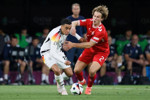 Germany v Denmark: Round of 16 - UEFA EURO, EM, Europameisterschaft,Fussball 2024 Jamal Musiala of Germany and Joachim Andersen of Denmark challenge during the UEFA EURO 2024 round of 16 match between Germany and Denmark at Football Stadium Dortmund on June 29, 2024 in Dortmund, Germany. Dortmund Football Stadium Dortmund Germany Germany Copyright: xRichardxSellers Sportsphoto APLx 14043112