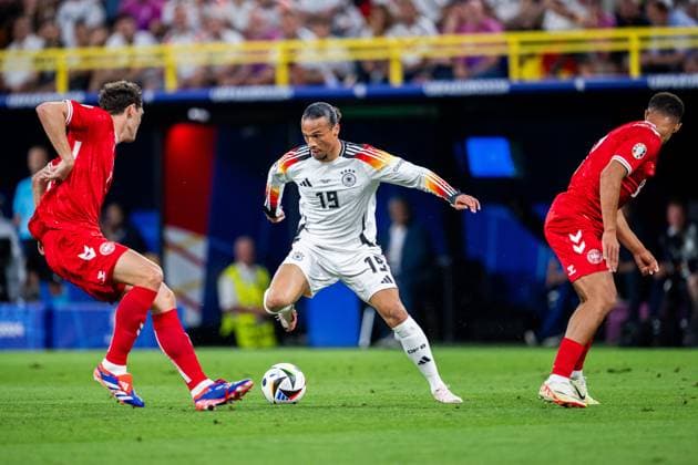 240629 Leroy Sane of Germany and Andreas Christensen and Alexander Bah of Denmark during the UEFA EURO, EM, Europameisterschaft,Fussball 2024 Football Championship round of 16 match between Germany and Denmark on June 29, 2024 in Dortmund. Photo: Jesper Zerman BILDBYRAN kod JZ JZ0545 fotboll football soccer fotball fotbolls-em europamästerskap em uefa euro uefa european football championship euro 2024 tyskland germany danmark denmark bbeng Copyright: JESPERxZERMAN BB240629JZ032