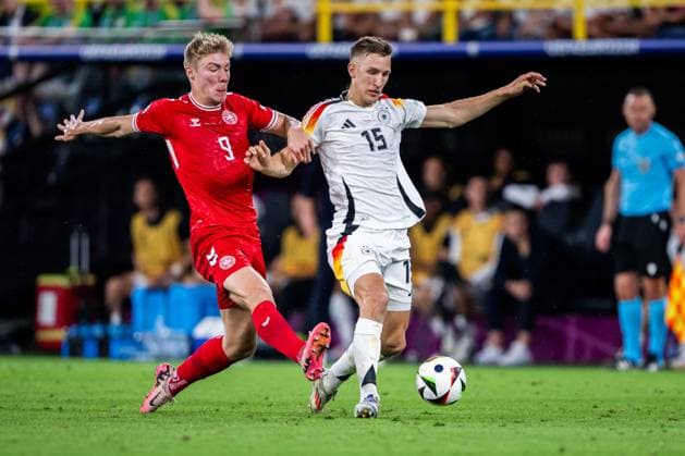 240629 Rasmus Hojlund of Denmark and Nico Schlotterbeck of Germany during the UEFA EURO, EM, Europameisterschaft,Fussball 2024 Football Championship round of 16 match between Germany and Denmark on June 29, 2024 in Dortmund. Photo: Jesper Zerman BILDBYRAN kod JZ JZ0545 fotboll football soccer fotball fotbolls-em europamästerskap em uefa euro uefa european football championship euro 2024 tyskland germany danmark denmark bbeng Copyright: JESPERxZERMAN BB240629JZ044