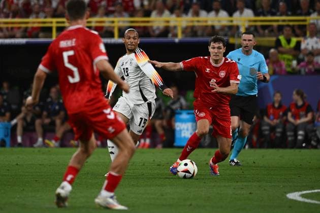 29.06.2024, xpsx, Fussball EM 2024 1 8 Finale, Deutschland - Dänemark emspor, v.l. Leroy Sane (Deutsche Fussball Nationalmannschaft DFB) Thomas Joseph Delaney (Dänemark Daenemark) Zweikampf, Aktion, action, battle for the ball (DFL DFB REGULATIONS PROHIBIT ANY USE OF PHOTOGRAPHS as IMAGE SEQUENCES and or QUASI-VIDEO) Dortmund