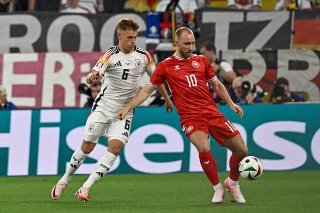 v. li. im Zweikampf Joshua Kimmich 6 (Germany) Christian Eriksen 10 (Denmark) 29.06.2024 Fussball Europameisterschaft in Deutschland Deutschland vs Denmark, Signal Iduna Park, Dortmund, NRW Germany