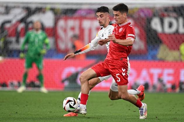 Germany Soccer Euro 2024 Germany - Denmark 8719345 29.06.2024 Germany s Kai Havertz and Denmark s Joakim Maehle, right, struggle for the ball during the UEFA EURO, EM, Europameisterschaft,Fussball 2024 Round of 16 soccer match between Germany and Denmark at the BVB Stadion Dortmund, in Dortmund, Germany. Alexey Filippov Sputnik Dortmund Germany  Copyright: xAlexeyxFilippovx