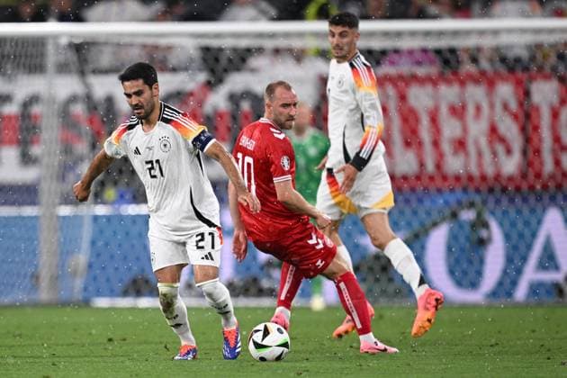 Germany Soccer Euro 2024 Germany - Denmark 8719350 29.06.2024 Germany s Ilkay Gundogan, left, bypasses Germany s Christian Eriksen during the UEFA EURO, EM, Europameisterschaft,Fussball 2024 Round of 16 soccer match between Germany and Denmark at the BVB Stadion Dortmund, in Dortmund, Germany. Alexey Filippov Sputnik Dortmund Germany  Copyright: xAlexeyxFilippovx