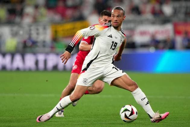 Germany s Leroy Sane fight for the ball with Denmark s Joakim Maehle during the Euro 2024 soccer match between Germany and Denmark at the BVB Stadium , Dortmund , Germany - Saturday 29 June 2024. - Soccer .  Copyright: xSpada LaPressex