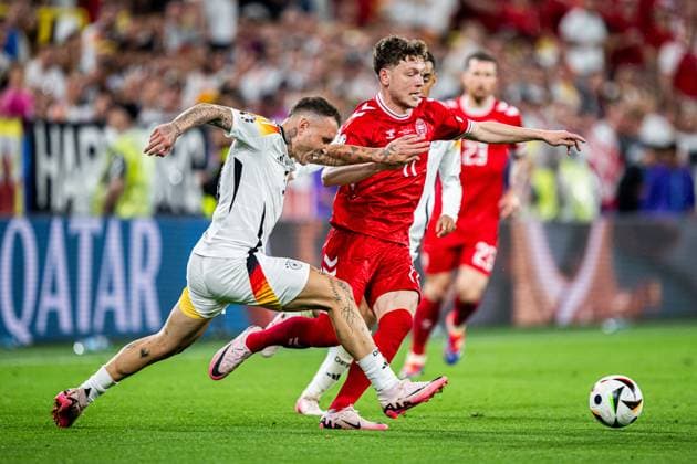 240629 David Raum of Germany and Andreas Skov Olsen of Denmark during the UEFA EURO, EM, Europameisterschaft,Fussball 2024 Football Championship round of 16 match between Germany and Denmark on June 29, 2024 in Dortmund. Photo: Jesper Zerman BILDBYRAN kod JZ JZ0545 fotboll football soccer fotball fotbolls-em europamästerskap em uefa euro uefa european football championship euro 2024 tyskland germany danmark denmark bbeng Copyright: JESPERxZERMAN BB240629JZ099