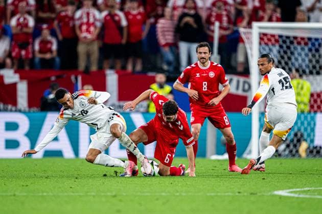 240629 Jamal Musiala of Germany and Andreas Christensen of Denmark during the UEFA EURO, EM, Europameisterschaft,Fussball 2024 Football Championship round of 16 match between Germany and Denmark on June 29, 2024 in Dortmund. Photo: Jesper Zerman BILDBYRAN kod JZ JZ0545 fotboll football soccer fotball fotbolls-em europamästerskap em uefa euro uefa european football championship euro 2024 tyskland germany danmark denmark bbeng Copyright: JESPERxZERMAN BB240629JZ104