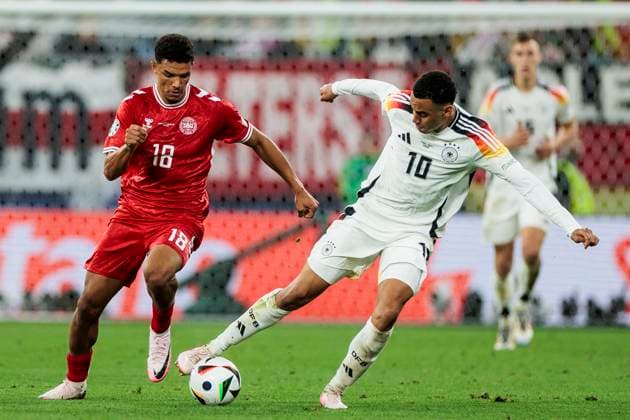 UEFA EURO, EM, Europameisterschaft,Fussball 2024: Deutschland - Dänemark; 29.06.2024 Alexander Hartmann Bah (Dänemark, 18), Jamal Musiala (Deutschland, 10). UEFA EURO 2024: Deutschland - Dänemark; BVB Stadion Dortmund, Dortmund am 29.06.2024 Copyright: xBEAUTIFULxSPORTS Wunderlx