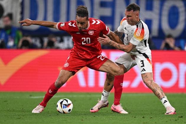 Germany Soccer Euro 2024 Germany - Denmark 8719448 29.06.2024 Denmark s Yussuf Poulsen, left, and Germany s David Raum struggle for the ball during the UEFA EURO, EM, Europameisterschaft,Fussball 2024 Round of 16 soccer match between Germany and Denmark at the BVB Stadion Dortmund, in Dortmund, Germany. Alexey Filippov Sputnik Dortmund Germany  Copyright: xAlexeyxFilippovx