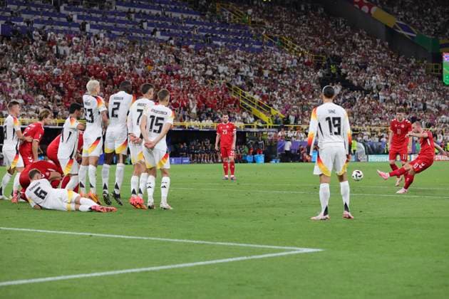 Germany v Denmark UEFA EURO, EM, Europameisterschaft,Fussball 2024 Christian Eriksen of Denmark has a shot on goal from a free kick but the wall does its job during the UEFA Euro 2024 Round of 16 match between Germany and Denmark at Signal Iduna Park, Dortmund UK Newspapers OUT Copyright: xPaulxChestertonx FIL-20311-0172