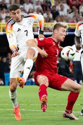 (240630) -- DORTMUND, June 30, 2024 -- Kai Havertz (L) of Germany vies against Rasmus Hojlund of Denmark during the UEFA EURO, EM, Europameisterschaft,Fussball 2024 Round of 16 match between Germany and Denmark in Dortmund, Germany, June 29, 2024. ) (SP)GERMANY-DORTMUND-FOOTBALL-EURO 2024-GERMANY VS DENMARK XiaoxYijiu 