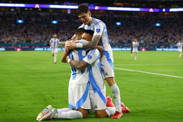 Argentina s forward Lautaro Martinez (C-hidden) celebrates with his teammates forward Angel Di Maria and forward Alejandro Garcnacho (R) after scoring the team™s second goal against Peru during the Copa America USA 2024, group A match between Argentina and Peru, at Hard Rock stadium in Miami, on June 29, 2024. MIAMI UNITED STATES Copyright: xALEJANDROxPAGNIx