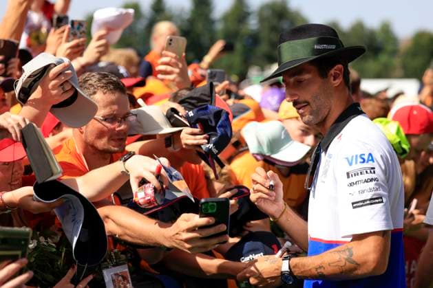 FORMULA 1 - GP of Austria 2024 SPIELBERG,AUSTRIA,30.JUN.24 - MOTORSPORTS, FORMULA 1 - Grand Prix of Austria, Red Bull Ring. Image shows Daniel Ricciardo (AUS VCARB) and fans.  GEPAxpictures xMarioxBuehner-Weinrauch