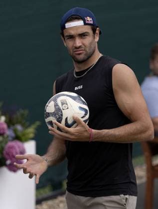 Matteo Berrettini of Italy holds a football Wimbledon Tennis Championships, Practice and Previews, The All England Lawn Tennis and Croquet Club, London, UK - 30 Jun 2024 EDITORIAL USE ONLY No use with unauthorised audio, video, data, fixture lists (outside the EU), club league logos or live services. Online in-match use limited to 45 images (+15 in extra time). No use to emulate moving images. No use in betting, games or  Copyright: xJavierxGarcia Shutterstockx 14560182ac