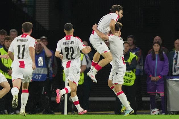 Georgia s Khvicha Kvaratskhelia celebrates after scoring goal 0-1 during the Euro 2024 soccer match between Spain and Georgia at the Cologne Stadium , Cologne , Germany - Sunday 30 June 2024. - Soccer .  Copyright: xSpada LaPressex