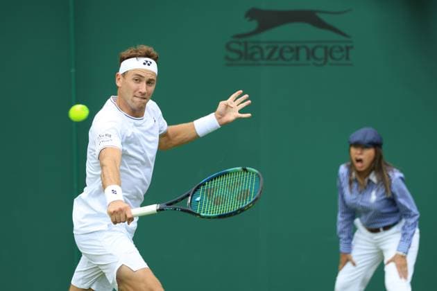 Norway s Casper Ruud plays a backhand in his first round match against Australian Alex Bolt on day one of the 2024 Wimbledon Championships in London on Monday, July 01, 2024.  LON2024070113 HUGOxPHILPOTT