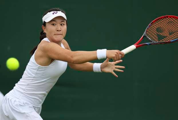(240701) -- LONDON, July 1, 2024 -- Zhu Lin hits a return during the women s singles first round match between Zhu Lin of China and Irina-Camelia Begu of Romania at Wimbledon tennis Championship in London, Britain, on July 1, 2024. ) (SP)BRITAIN-LONDON-TENNIS-WIMBLEDON-DAY 1 HanxYan 