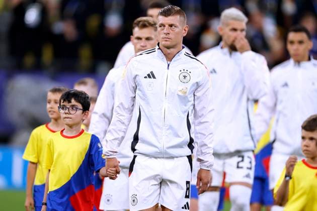 KROOS Toni Team Deutschland mit Ballkind beim Einmarsch vor dem Spiel UEFA Fussball EURO 2024 in Deutschland Achtelfinale Spiel Deutschland - Daenemark 2 : 0 am 29.06.2024 in Dortmund DFL REGULATIONS PROHIBIT ANY USE OF PHOTOGRAPHS as IMAGE SEQUENCES and or QUASI-VIDEO Copyright: xLacixPerenyix