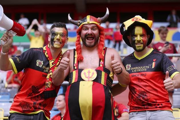 Dusseldorf, Germany, 1st July 2024. Belgium fans arrive prior to the UEFA European Championships Round of 16 match at Dusseldorf Arena, Dusseldorf. Picture credit should read: Paul Terry Sportimage EDITORIAL USE ONLY. No use with unauthorised audio, video, data, fixture lists, club league logos or live services. Online in-match use limited to 120 images, no video emulation. No use in betting, games or single club league player publications. SPI-3216-0006