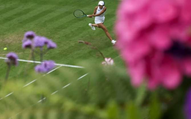 (240701) -- LONDON, July 1, 2024 -- Zhang Shuai competes during the women s singles first round match between Zhang Shuai of China and Daria Kasatkina of Russia at Wimbledon tennis Championship in London, Britain, on July 1, 2024. ) (SP)BRITAIN-LONDON-TENNIS-WIMBLEDON-DAY 1 HanxYan 