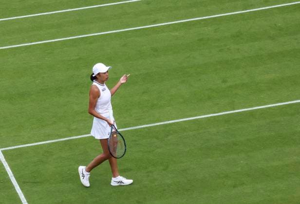 (240701) -- LONDON, July 1, 2024 -- Zhang Shuai questions a call during the women s singles first round match between Zhang Shuai of China and Daria Kasatkina of Russia at Wimbledon tennis Championship in London, Britain, on July 1, 2024. ) (SP)BRITAIN-LONDON-TENNIS-WIMBLEDON-DAY 1 HanxYan 