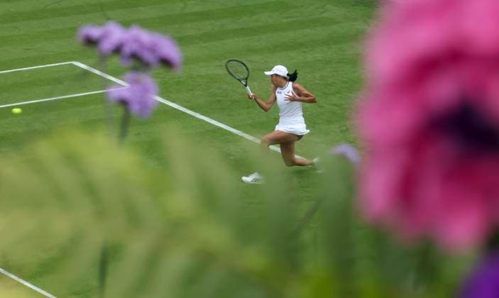 (240701) -- LONDON, July 1, 2024 -- Zhang Shuai competes during the women s singles first round match between Zhang Shuai of China and Daria Kasatkina of Russia at Wimbledon tennis Championship in London, Britain, on July 1, 2024. ) (SP)BRITAIN-LONDON-TENNIS-WIMBLEDON-DAY 1 HanxYan 