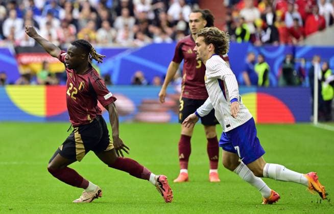 Belgium s Jeremy Doku and France s Antoine Griezmann pictured in action during a soccer game between France and Belgian national soccer team Red Devils, Monday 01 July 2024 in Dusseldorf, Germany, the Round of 16 game in the UEFA EURO, EM, Europameisterschaft,Fussball 2024 European championships. DIRKxWAEM  x95641600x