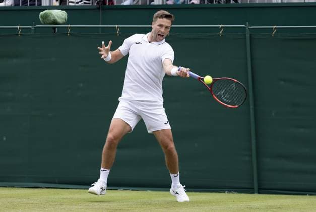 Liam Broady of GB in action Wimbledon Tennis Championships, Day 1, The All England Lawn Tennis and Croquet Club, London, UK - 01 Jul 2024  Copyright: xEllaxLing Shutterstockx 14565035y