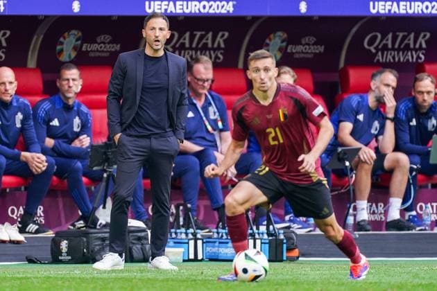 2024-07-01 France v Belgium - Round of 16 - UEFA EURO, EM, Europameisterschaft,Fussball 2024 DUSSELDORF, GERMANY - JULY 1: Coach Domenico Tedesco of Belgium looks on, Timothy Castagne of Belgium runs with the ball during the Round of 16 - UEFA EURO 2024 match between France and Belgium at Dusseldorf Arena on July 1, 2024 in Dusseldorf, Germany. (Photo by Joris Verwijst BSR Agency) Dusseldorf Germany Content not available for redistribution in The Netherlands directly or indirectly through any third parties. Copyright: xBSRxAgencyx